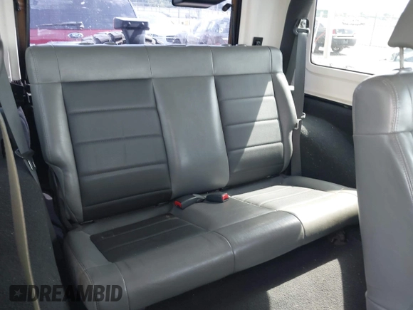 2008 Jeep Wrangler X with VIN 1J4FA24138L521983, listed as a IAAI auction lot 42263960 with 113,971 mi miles and . Bid and sale history available at DreamBid. Image 8.