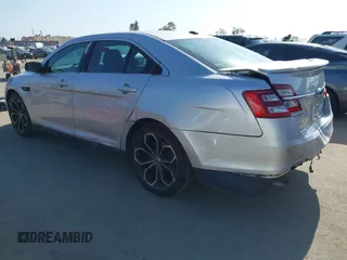 2014 Ford Taurus SHO with VIN 1FAHP2KT8EG123342, listed as a IAAI auction lot 42095390 with 142,957 mi miles. Bid and sale history available at carsss.com. Image 3.