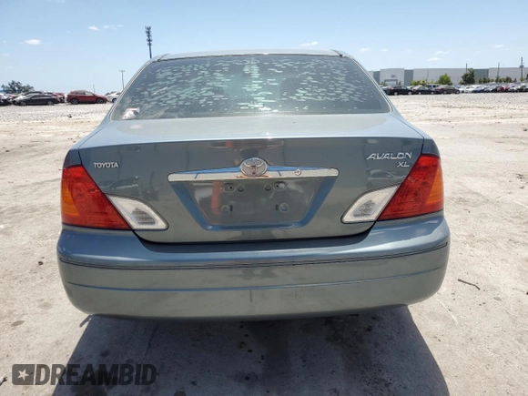 2000 Toyota Avalon XL с VIN 4T1BF28B6YU104579, выставлен на аукционе Copart как лот 54129515 с пробегом 145 273 миль миль и Списание • Salvage title. История ставок и продаж доступна на DreamBid. Изображение 6.