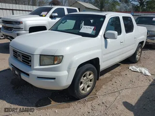 2007 Honda Ridgeline RTL w/Leather with VIN 2HJYK16547H529037, listed as a IAAI auction lot 41763786 with 195,240 mi miles. Bid and sale history available at carsss.com. Image 2.