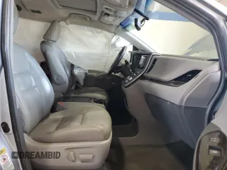 2015 Toyota Sienna XLE with VIN 5TDYK3DC9FS589378, listed as a Copart auction lot 54219075 with 117,766 mi miles and Salvage Title. Bid and sale history available at DreamBid. Image 7.