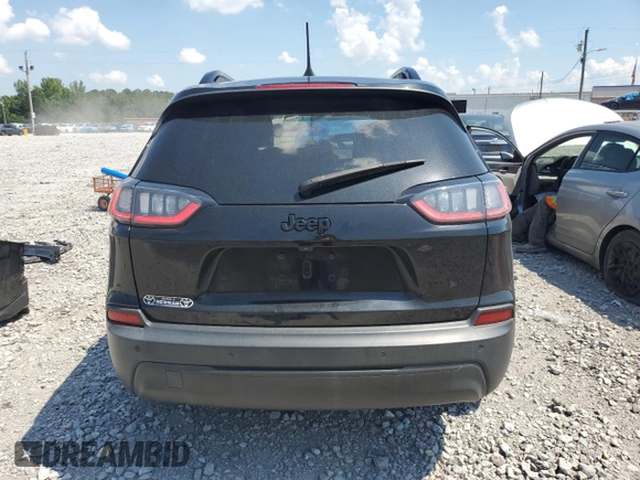 2021 Jeep Cherokee Altitude with VIN 1C4PJLLBXMD144549, listed as a Copart auction lot 62163435 with 94,571 mi miles and Salvage title. Bid and sale history available at DreamBid. Image 6.