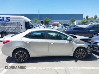 2016 Toyota Corolla L z VIN 5YFBURHE4GP410981, wystawiony jako IAAI lot #42293582 z przebiegiem 77 319 mil mil oraz . Historia ofert i sprzedaży dostępna na DreamBid. Obrazek 14.
