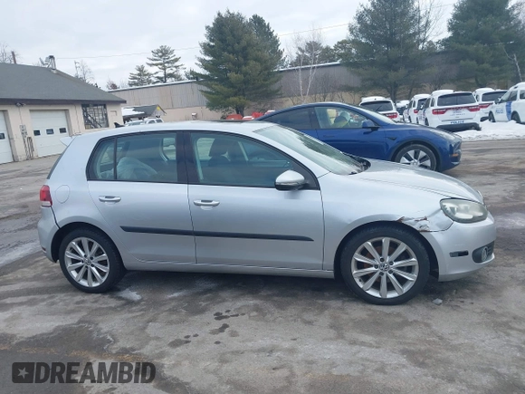 2013 Volkswagen Golf TDI z VIN WVWDM7AJ7DW137767, wystawiony jako IAAI lot #41548852 z przebiegiem 102 984 mil mil oraz . Historia ofert i sprzedaży dostępna na DreamBid. Obrazek 12.