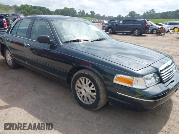 2003 Ford Crown Victoria LX z VIN 2FAFP74WX3X184730, wystawiony jako IAAI lot #42264132 z przebiegiem 297 561 mil mil oraz . Historia ofert i sprzedaży dostępna na DreamBid. Obrazek 1.