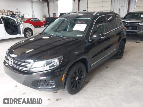 2017 Volkswagen Tiguan Wolfsburg Edition with VIN WVGRV7AX3HK019747, listed as a IAAI auction lot 42489111 with 86,444 mi miles and . Bid and sale history available at DreamBid. Image 2.