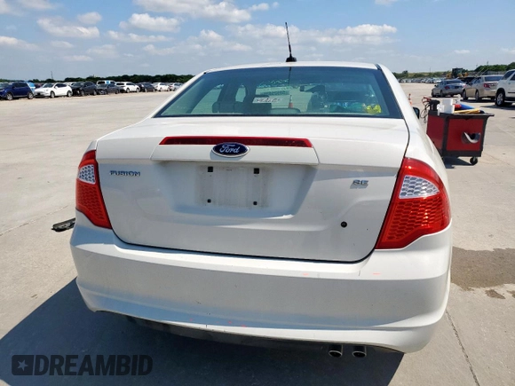 2012 Ford Fusion SE z VIN 3FAHP0HA9CR395558, wystawiony jako Copart lot #58925035 z przebiegiem 126 089 mil mil oraz Szkoda całkowita • Salvage title. Historia ofert i sprzedaży dostępna na DreamBid. Obrazek 6.