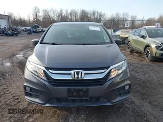 2018 Honda Odyssey LX with VIN 5FNRL6H27JB095795, listed as a IAAI auction lot 41780386 with 99,318 mi miles. Bid and sale history available at carsss.com. Image 12.
