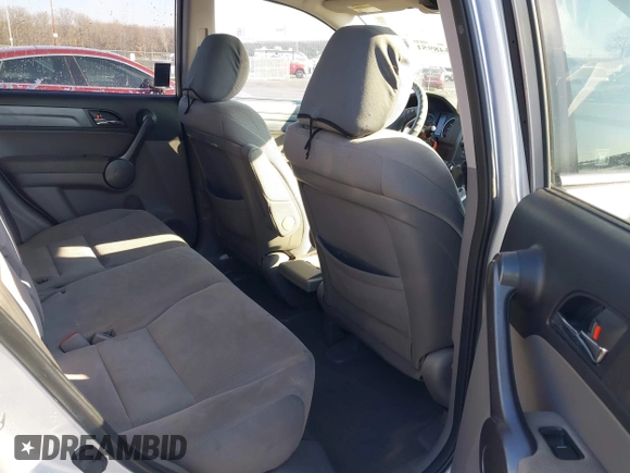 2009 Honda CR-V EX with VIN 3CZRE38589G704086, listed as a IAAI auction lot 41348951 with 128,784 mi miles and . Bid and sale history available at carsss.com. Image 8.