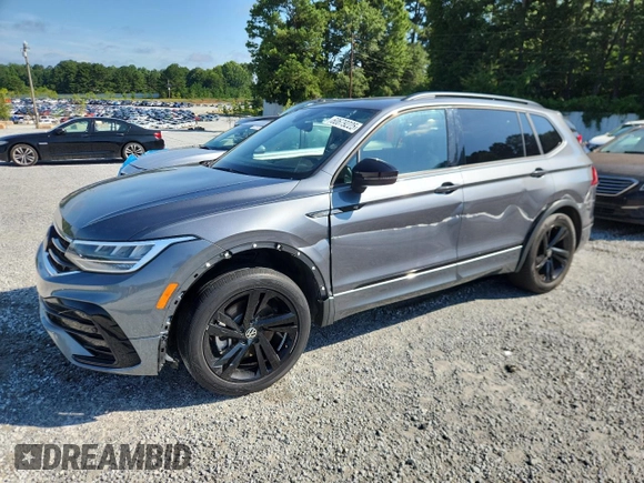 2023 Volkswagen Tiguan SE R-Line Black with VIN 3VVCB7AX3PM056471, listed as a Copart auction lot 60679225 with 94,752 mi miles and Clean title. Bid and sale history available at DreamBid. Image 1.