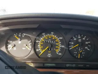 1986 Mercedes-Benz 300 with VIN WDBCB25D9GA279756, listed as a Copart auction lot 46860345 with 210,386 mi miles and Salvage Title. Bid and sale history available at carsss.com. Image 9.