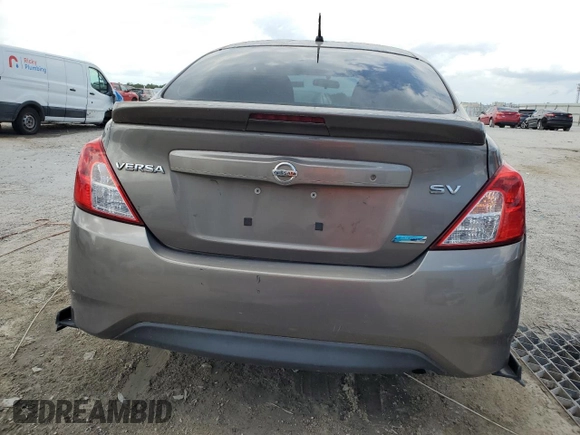 2016 Nissan Versa S with VIN 3N1CN7AP4GL808905, listed as a Copart auction lot 58518875 with 115,679 mi miles and Salvage title. Bid and sale history available at DreamBid. Image 6.