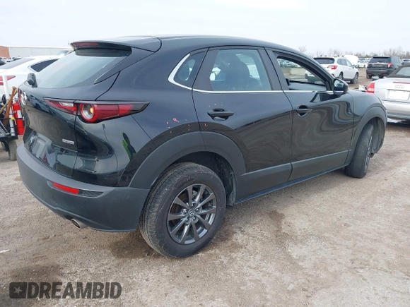 2021 Mazda CX-30 2.5 S with VIN 3MVDMAAL2MM303321, listed as a IAAI auction lot 41583346 with 57,122 mi miles. Bid and sale history available at carsss.com. Image 4.