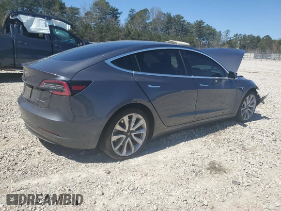 2020 Tesla Model 3 Long Range with VIN 5YJ3E1EBXLF807033, listed as a Copart auction lot 49548665 with 32,031 mi miles and Salvage Title. Bid and sale history available at carsss.com. Image 3.