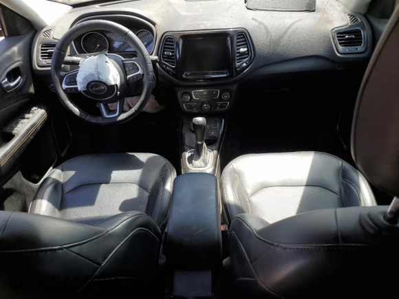 2018 Jeep Compass Limited with VIN 3C4NJDCB9JT261879, listed as a Copart auction lot 56523365 with 172,382 mi miles and Salvage title. Bid and sale history available at DreamBid. Image 8.