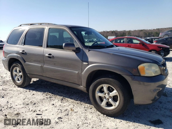 2006 Mazda Tribute S with VIN 4F2YZ04176KM19634, listed as a Copart auction lot 46796315 with 276,632 mi miles and Salvage Title. Bid and sale history available at DreamBid. Image 4.