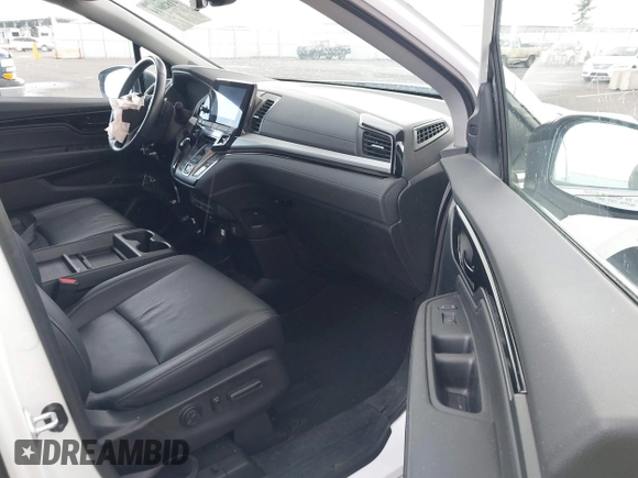 2022 Honda Odyssey Touring with VIN 5FNRL6H8XNB057293, listed as a IAAI auction lot 41826014 with 30,454 mi miles and . Bid and sale history available at DreamBid. Image 5.