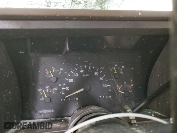 1993 GMC Sierra 1500 z VIN 2GTEK19K8P1562964, wystawiony jako Copart lot #86767744 z przebiegiem 237 615 mil mil oraz Czysty tytuł • Clean title. Historia ofert i sprzedaży dostępna na DreamBid. Obrazek 9.