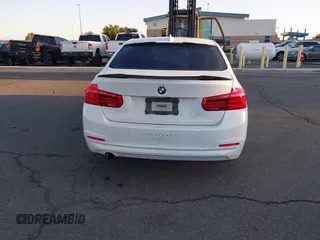 2018 BMW 3 Series 320i with VIN WBA8E1G54JNU90990, listed as a IAAI auction lot 41801197 with 140,603 mi miles. Bid and sale history available at carsss.com. Image 16.