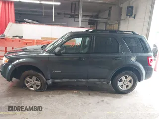 2009 Ford Escape Hybrid with VIN 1FMCU49339KB19700, listed as a IAAI auction lot 42253749 with 169,299 mi miles and . Bid and sale history available at DreamBid. Image 14.