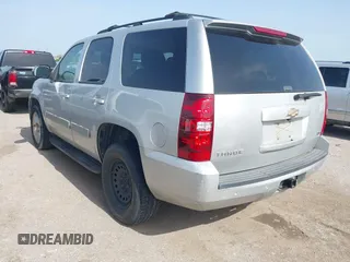 2011 Chevrolet Tahoe LS with VIN 1GNSCAE0XBR111949, listed as a IAAI auction lot 42630787 with 220,857 mi miles and . Bid and sale history available at DreamBid. Image 3.