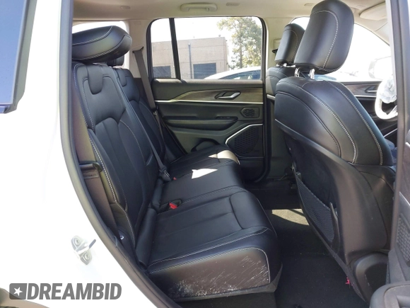 2022 Jeep Grand Cherokee with VIN 1C4RJYB66N8718018, listed as a IAAI auction lot 42002051 with Not provided miles and . Bid and sale history available at DreamBid. Image 8.