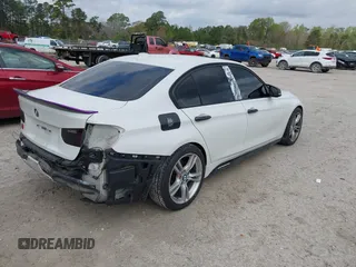 2014 BMW 3 Series 328i with VIN WBA3A5C59EP601126, listed as a IAAI auction lot 41921844 with 124,844 mi miles. Bid and sale history available at carsss.com. Image 4.