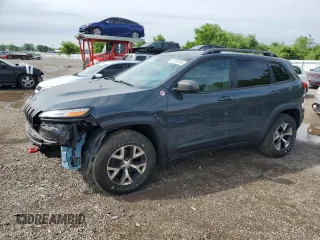 2018 Jeep Cherokee Trailhawk with VIN 1C4PJMBBXJD592860, listed as a Copart auction lot 60865145 with 124,130 mi miles and Clean title. Bid and sale history available at DreamBid. Image 1.