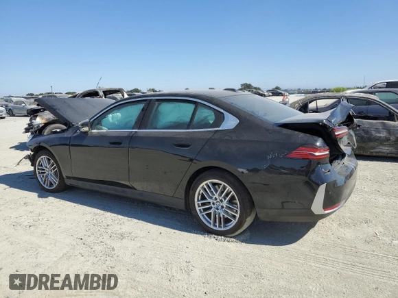 2024 BMW 5 Series 540i xDrive with VIN WBA63FJ06RCR29413, listed as a Copart auction lot 74137104 with 0 mi miles and Salvage Title. Bid and sale history available at carsss.com. Image 2.