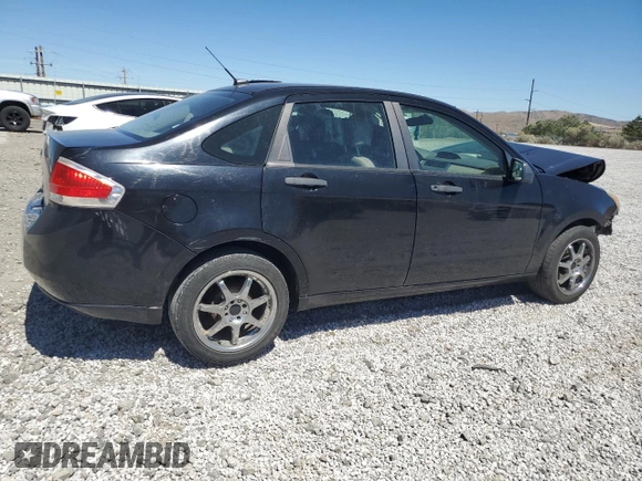 2009 Ford Focus S with VIN 1FAHP34N79W111747, listed as a Copart auction lot 66955294 with Not Provided miles and Salvage Title. Bid and sale history available at DreamBid. Image 3.
