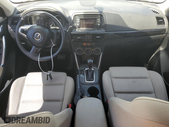 2015 Mazda CX-5 Touring with VIN JM3KE2CY5F0548826, listed as a Copart auction lot 52686565 with 139,602 mi miles and Salvage Title. Bid and sale history available at carsss.com. Image 8.