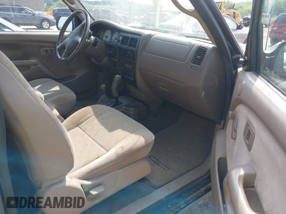 2002 Toyota Tacoma with VIN 5TEWM72NX2Z097369, listed as a IAAI auction lot 42476892 with 90,855 mi miles and . Bid and sale history available at DreamBid. Image 5.