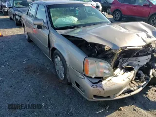 2003 Cadillac DeVille DTS z VIN 1G6KF57963U125853, wystawiony jako Copart lot #42559975 z przebiegiem Nie podano mil oraz Szkody całkowita. Historia ofert i sprzedaży dostępna na DreamBid. Obrazek 11.