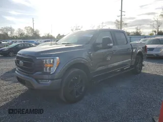 2023 Ford F-150 XL with VIN 1FTEW1EP4PFB38678, listed as a Copart auction lot 43024045 with 8,718 mi miles and Salvage title. Bid and sale history available at DreamBid. Image 1.
