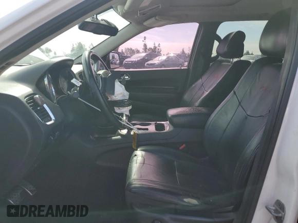 2013 Dodge Durango R/T with VIN 1C4SDHCT2DC559006, listed as a Copart auction lot 49275695 with 117,323 mi miles and Salvage title. Bid and sale history available at DreamBid. Image 7.