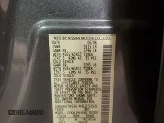 2006 Nissan Frontier SE z VIN 1N6AD07W26C462566, wystawiony jako Copart lot #57869935 z przebiegiem 225 205 mil mil oraz Szkoda całkowita • Salvage title. Historia ofert i sprzedaży dostępna na DreamBid. Obrazek 13.