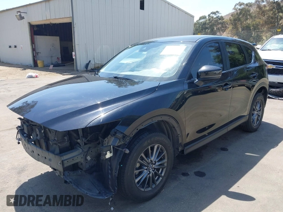 2019 Mazda CX-5 Sport with VIN JM3KFABM7K1509987, listed as a IAAI auction lot 42062804 with 50,898 mi miles and . Bid and sale history available at DreamBid. Image 20.