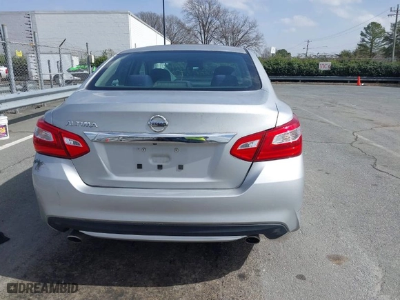 2016 Nissan Altima 2.5 SR with VIN 1N4AL3AP4GC238182, listed as a IAAI auction lot 41732285 with 129,278 mi miles. Bid and sale history available at carsss.com. Image 16.