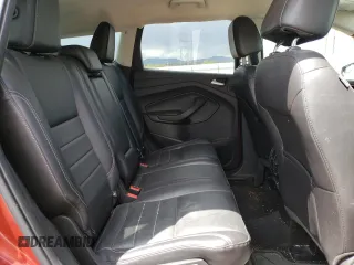 2016 Ford Escape SE z VIN 1FMCU9G9XGUC27074, wystawiony jako Copart lot #55788625 z przebiegiem 106 990 mil mil oraz Szkoda całkowita • Salvage title. Historia ofert i sprzedaży dostępna na DreamBid. Obrazek 11.