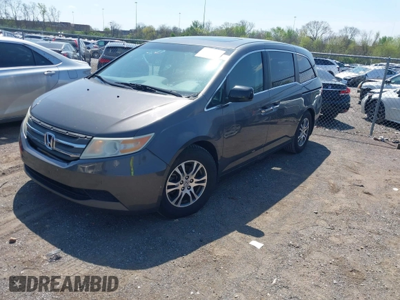 2013 Honda Odyssey EX-L with VIN 5FNRL5H65DB011071, listed as a IAAI auction lot 41992265 with 192,624 mi miles and . Bid and sale history available at DreamBid. Image 17.