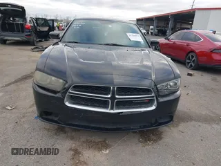 2014 Dodge Charger SE with VIN 2C3CDXBG2EH187978, listed as a IAAI auction lot 41246875 with 106,635 mi miles and . Bid and sale history available at DreamBid. Image 12.