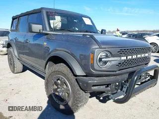 2021 Ford Bronco z VIN 1FMEE5DHXMLA96241, wystawiony jako IAAI lot #41246342 z przebiegiem 34 178 mil mil oraz . Historia ofert i sprzedaży dostępna na DreamBid. Obrazek 1.
