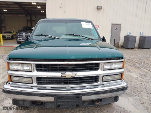1996 Chevrolet Tahoe with VIN 1GNEK13R1TJ388054, listed as a IAAI auction lot 41368047 with 155,138 mi miles. Bid and sale history available at carsss.com. Image 6.