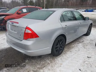 2010 Ford Fusion SEL with VIN 3FAHP0CG0AR190350, listed as a IAAI auction lot 41469092 with 151,324 mi miles. Bid and sale history available at carsss.com. Image 4.