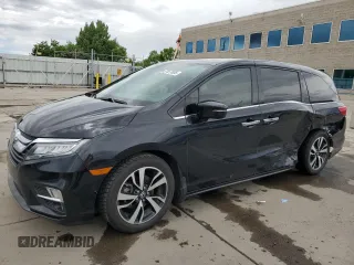 2018 Honda Odyssey Elite z VIN 5FNRL6H94JB007489, wystawiony jako Copart lot #57077855 z przebiegiem 106 402 mil mil oraz Szkoda całkowita • Salvage title. Historia ofert i sprzedaży dostępna na DreamBid. Obrazek 1.