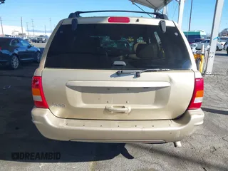 1999 Jeep Grand Cherokee Limited with VIN 1J4GW68NXXC727844, listed as a IAAI auction lot 41290773 with 222,838 mi miles. Bid and sale history available at carsss.com. Image 17.