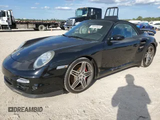 2008 Porsche 911 z VIN WP0CD29968S788944, wystawiony jako Copart lot #76059604 z przebiegiem 96 537 mil mil oraz Szkoda całkowita • Salvage title. Historia ofert i sprzedaży dostępna na DreamBid. Obrazek 1.
