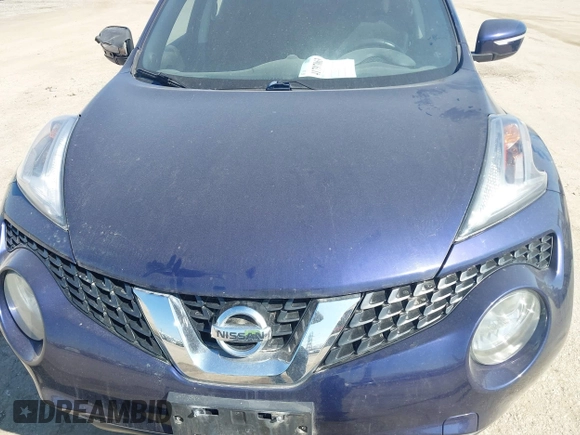2015 Nissan Juke S with VIN JN8AF5MVXFT561176, listed as a IAAI auction lot 41797063 with 92,235 mi miles and . Bid and sale history available at carsss.com. Image 6.