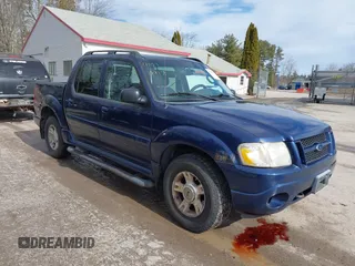 2004 Ford Explorer Sport Trac XLS z VIN 1FMDU77K64UA27607, wystawiony jako IAAI lot #41819917 z przebiegiem 188 574 mil mil oraz . Historia ofert i sprzedaży dostępna na DreamBid. Obrazek 1.