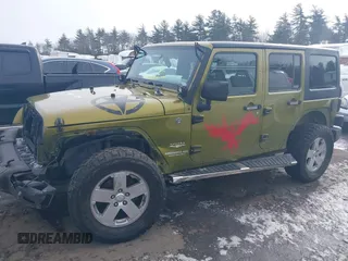2007 Jeep Wrangler Unlimited Sahara z VIN 1J4GA59137L147257, wystawiony jako IAAI lot #41565673 z przebiegiem 187 982 mil mil oraz . Historia ofert i sprzedaży dostępna na DreamBid. Obrazek 6.